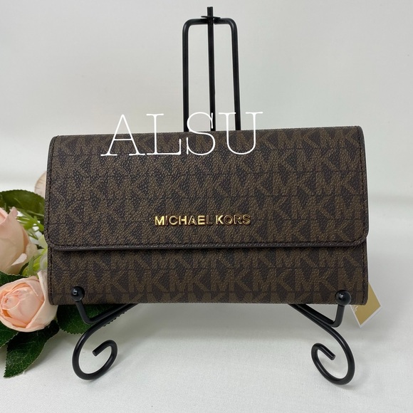 Michael Kors Handbags - Michael Kors Tri Folder Wallet Large Brown W AUTHE